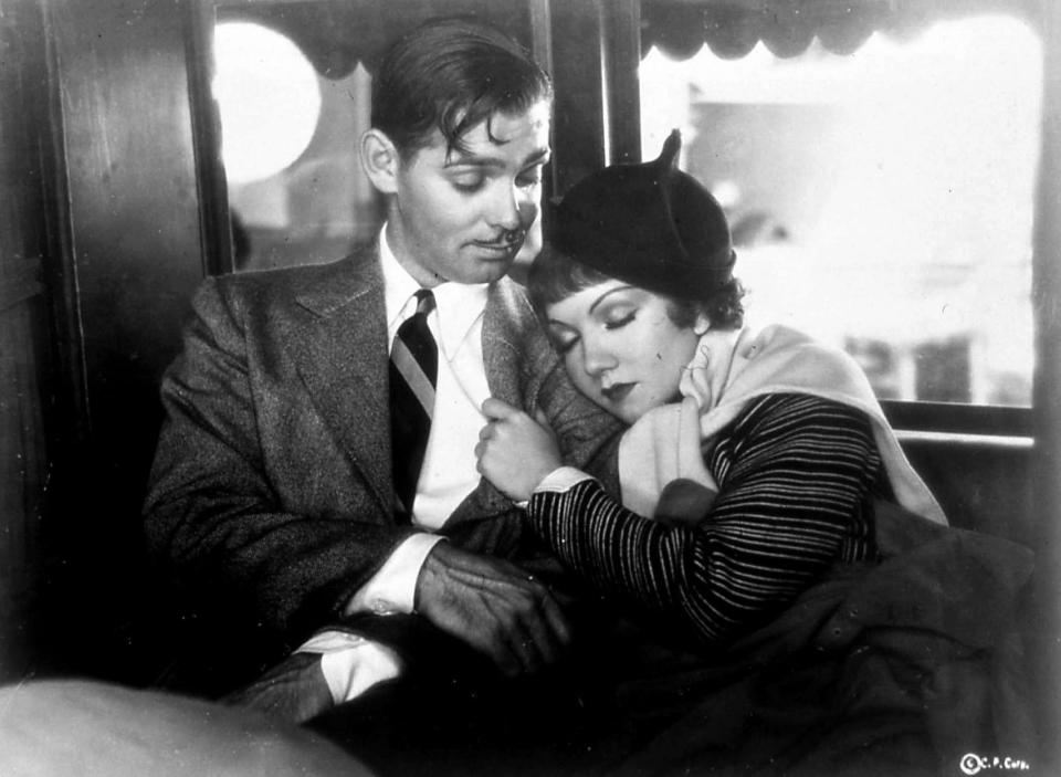 Clark Gable's out-of-work journalist and Claudette Colbert's runaway heiress meet cute in the Frank Capra romantic comedy "It Happened One Night."