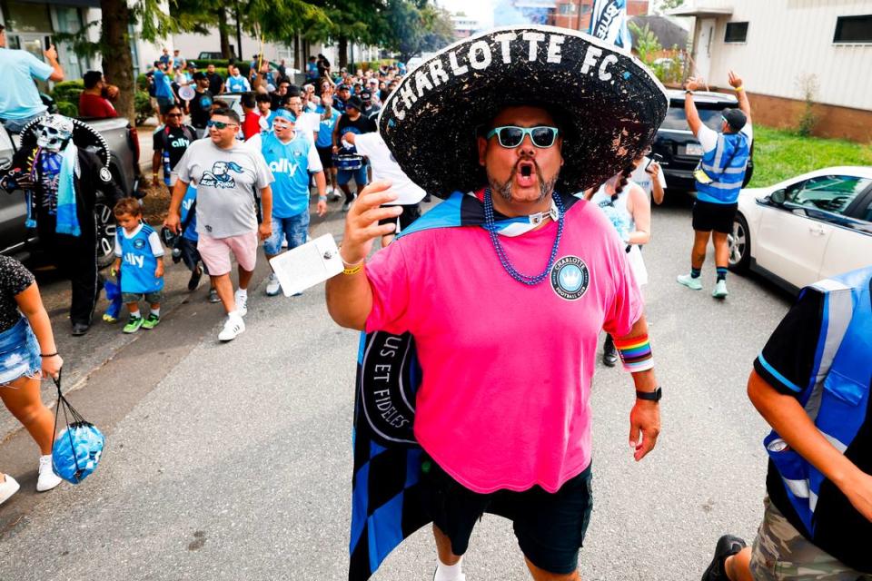 Hector Cortes marches with fans over before Charlotte FC takes on Columbus Crew at Bank of America Stadium in Charlotte, N.C., Saturday, July 30, 2022.