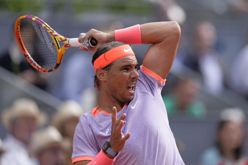 Rafael Nadal of Spain watches his shot against Pedro Cachin of Argentina during the Mutua Madrid Open tennis tournament in Madrid, Spain, Monday, April 29, 2024. (AP Photo/Manu Fernandez)