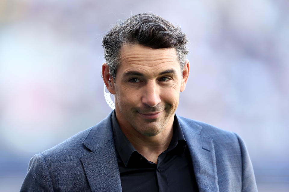 Billy Slater looks on during broadcast.