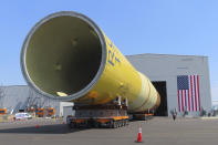 Part of a foundation for an offshore wind turbine rests on rollers outside a manufacturing facility in Paulsboro, N.J. on July 6, 2023. New Jersey's Cape May County and environmental and fishing industry groups are suing the federal government to try to overturn its approval New Jersey's first offshore wind farm, which would be built by Danish company Orsted. (AP Photo/Wayne Parry)