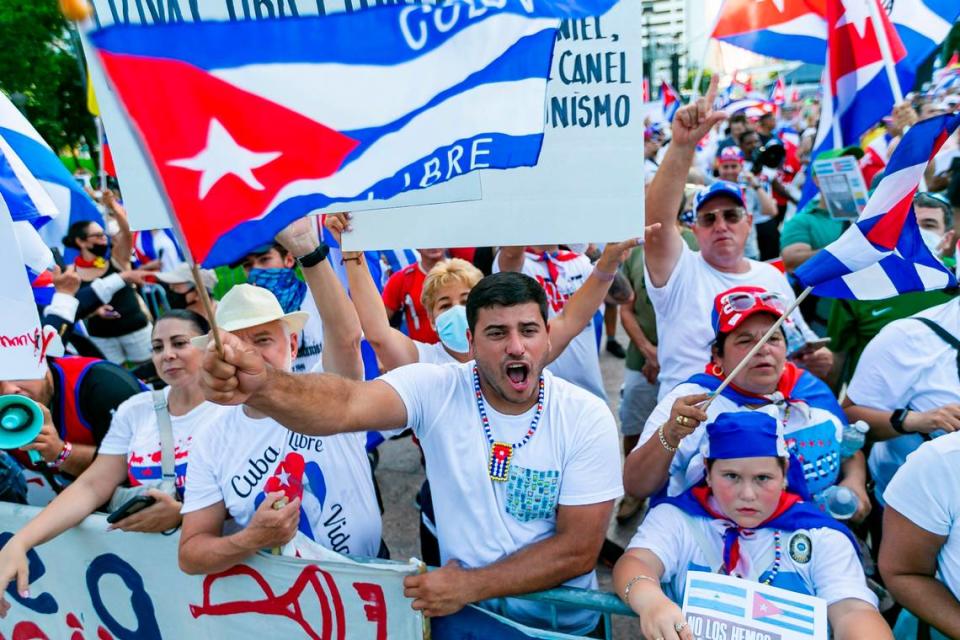 Activists participate in a rally at Bayfront Park in downtown Miami on Saturday, July 31, 2021. The rally was held in solidarity with the anti-government protests happening in Cuba.