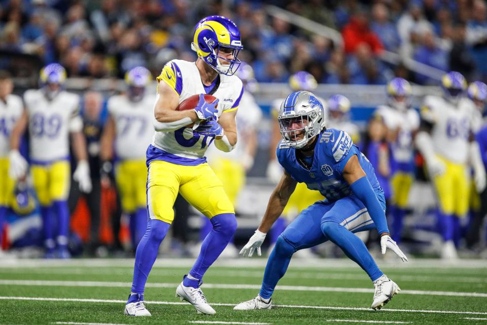 Detroit Lions cornerback Khalil Dorsey looks to tackle Rams punt returner Austin Trammell during the second half of the NFL wild-card playoff game at Ford Field in Detroit on Sunday, Jan. 14, 2024.