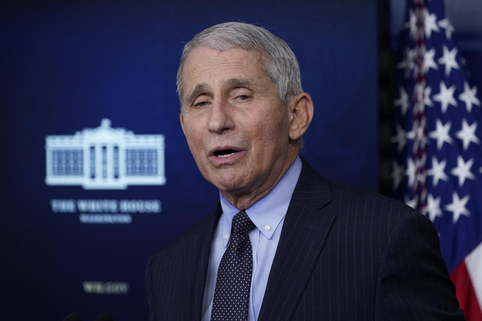 In this Jan. 21, 2021, photo, Dr. Anthony Fauci, director of the National Institute of Allergy and Infectious Diseases, speaks with reporters in the James Brady Press Briefing Room at the White House in Washington. President Joe Biden is dispatching the nation’s top scientists and public health experts to regularly brief the American public about the pandemic. Beginning Jan. 27, the experts will host briefings three times a week on the state of the outbreak and efforts to control it. (AP Photo/Alex Brandon)