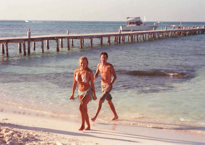 Pamela Anderson and Greek born Tommy Lee on the beach