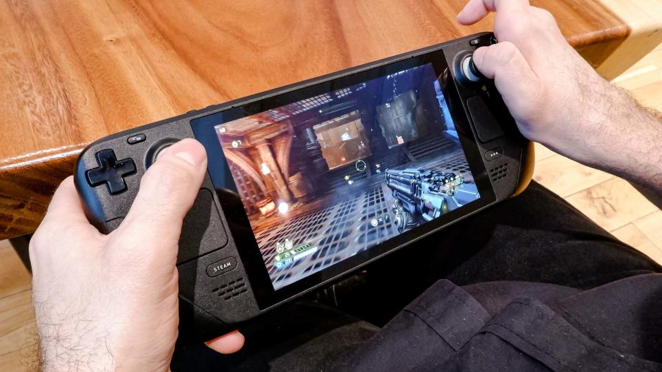 Steam Deck handheld playing games