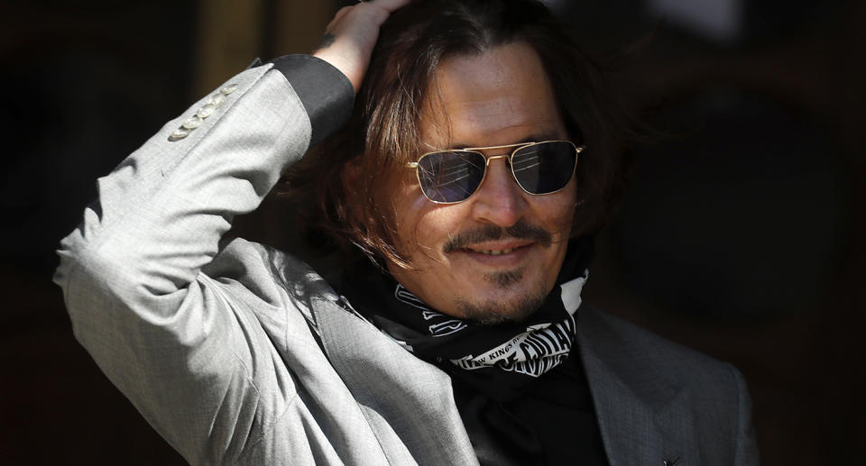 Actor Johnny Depp arrives at the High Court in London during his case against News Group Newspapers over a story published about his former wife Amber Heard, which branded him a 'wife beater'.