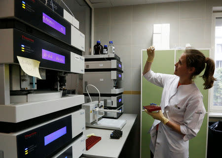 Technician Natalia Bochkaryova works at the Russian anti-doping laboratory in Moscow, Russia, May 24, 2016. REUTERS/Sergei Karpukhin