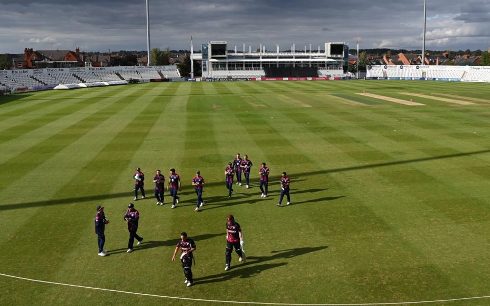 The players leave the field at the end of the T20 Vitality Blast 2020 match between Northamptonshire Steelbacks and Somerset at The County Ground on August 30, 2020 in Northampton, England