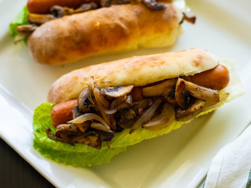 hot dog with mushrooms and lettuce