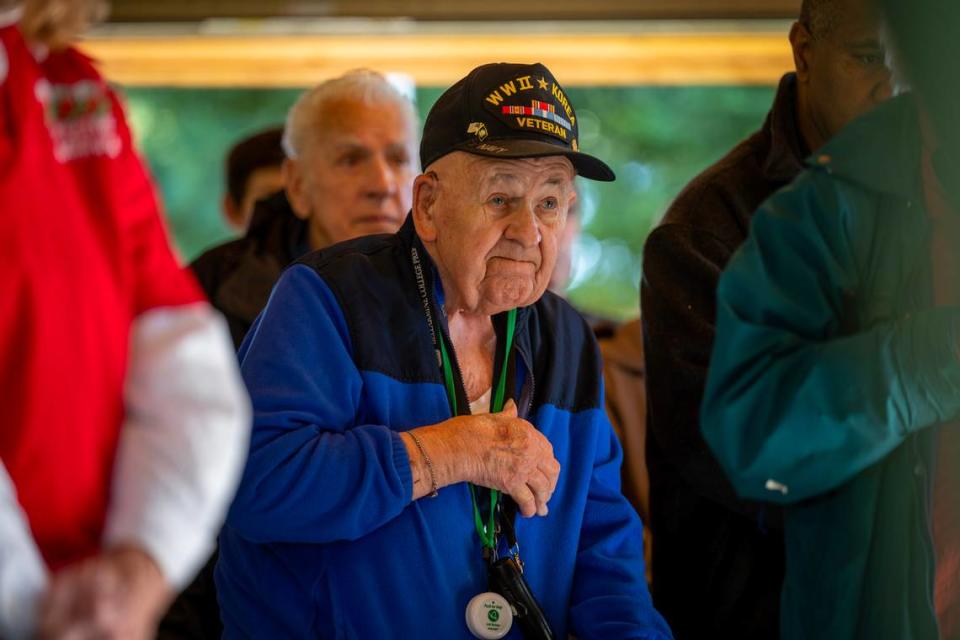 World War ll veteran William Fawx, 98, of Newcastle, stands during a remembrance ceremony at Newcastle Cemetery on Dec. 17. About 525 truckloads of wreaths were delivered to the Newcastle cemetery district, which included wreaths for other Placer County sites.