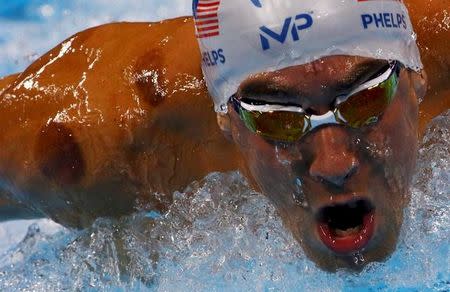 Michael Phelps (USA) of USA competes. REUTERS/David Gray