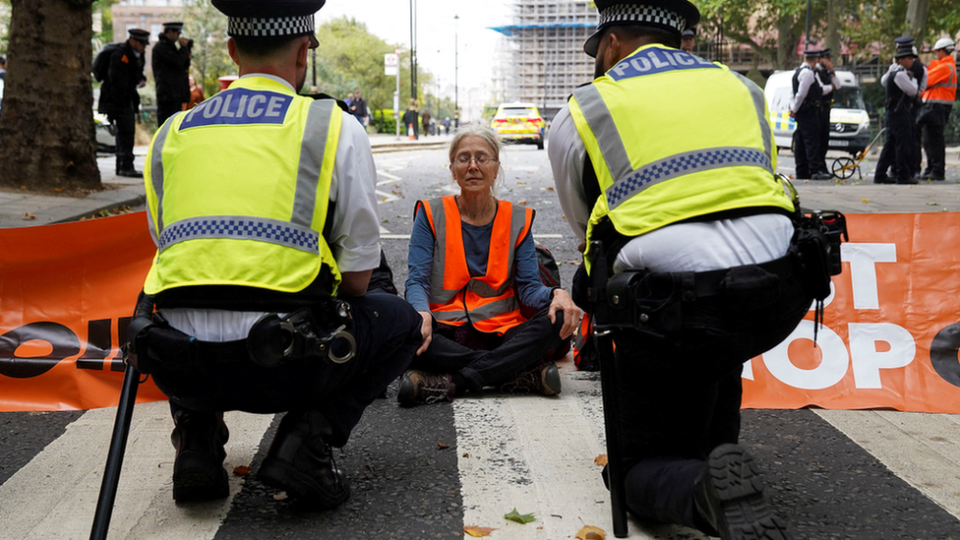 A Just Stop Oil protester blocking the road