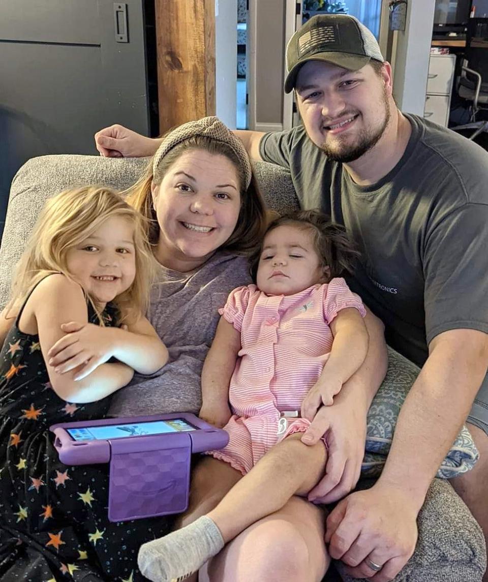 Jacob and Ashley Wiley with their daughters, Adelaide and Aislynn.