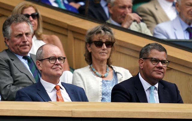 Sir Patrick Vallance and Cop26 President Alok Sharma at the men's singles final (John Walton/PA)