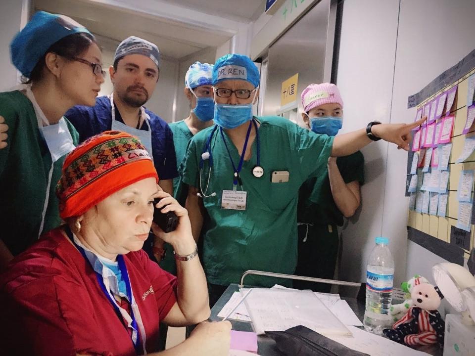 Claire Donaghy (bottom), an Operation Smile volunteer from New Jersey, has been a clinical coordinator for charity surgical teams for more than a decade.