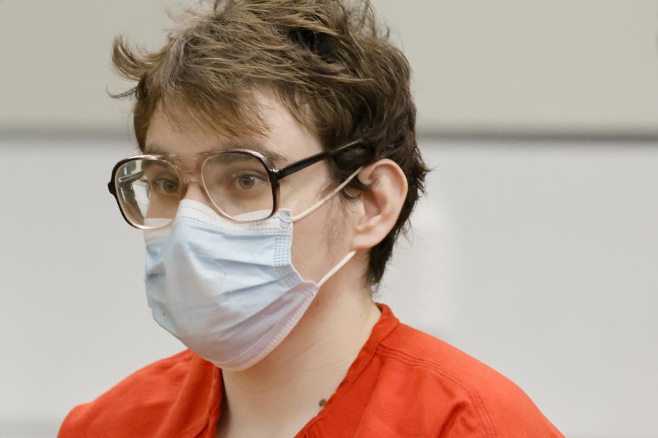 Marjory Stoneman Douglas High School shooter Nikolas Cruz sits at the the defense table during his sentencing hearing at the Broward County Courthouse in Fort Lauderdale, Fla. on Tuesday, Nov. 1, 2022. Cruz was sentenced to life in prison for murdering 17 people more in 2018. (Amy Beth Bennett/South Florida Sun Sentinel via AP, Pool)