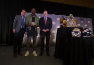 Feb 8, 2016; San Francisco, CA, USA; Super Bowl 50 winning head coach Denver Broncos head coach Gary Kubiak , outside linebacker Von Miller and NFL commissioner Roger Goodell pose during a press conference at the Super Bowl Media Center at Moscone Center-West. Mandatory Credit: Kelley L Cox-USA TODAY Sports