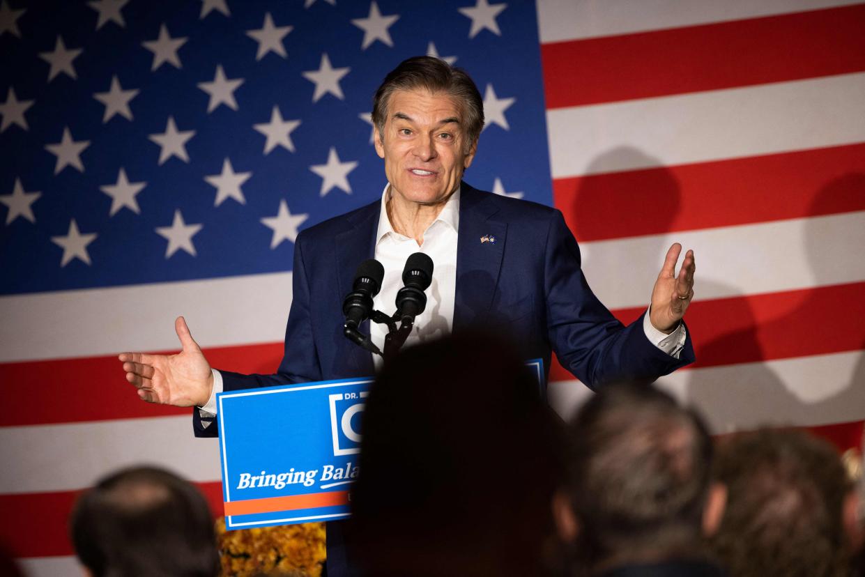 A victory for Republican Senate nominee Mehmet Oz in Pennsylvania over Democrat John Fetterman would deliver a major blow to Democrats' chances to hold onto the Senate. Here, Oz is seen gesturing as he speaks during a campaign rally in Elizabethtown, Pennsylvania, on November 2, 2022.