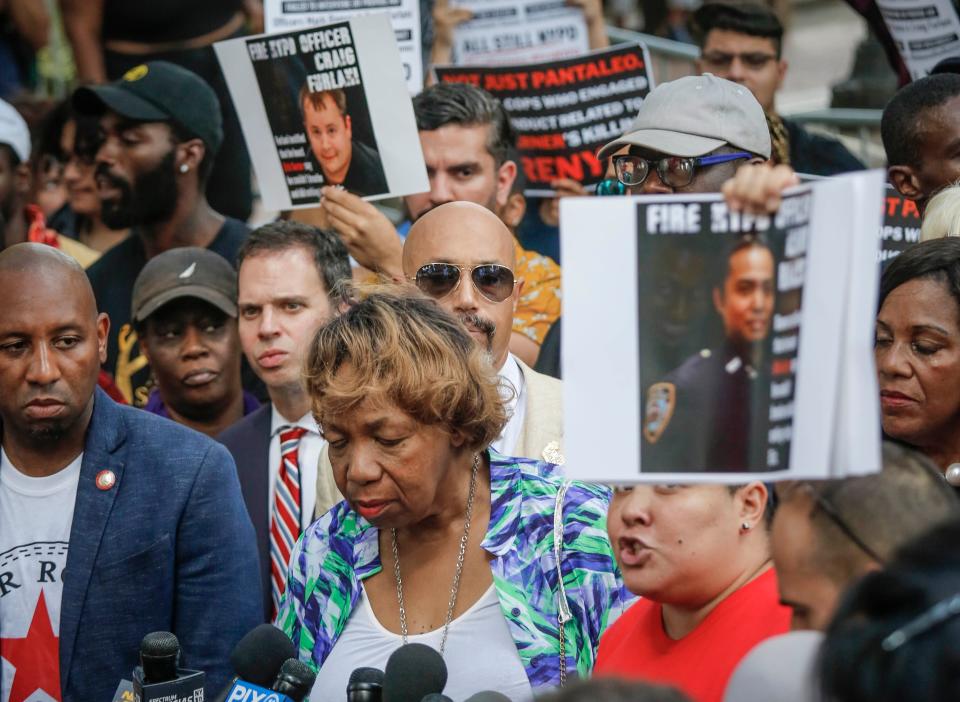 Gwen Carr, the mother of chokehold victim Eric Garner, listens during a news conference after NYPD Commissioner James O'Neill announced his decision to fire officer Daniel Pantaleo for Garner's 2014 death.