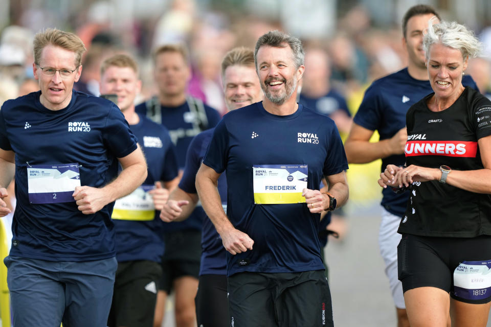 FILE - Denmark's Crown Prince Frederik, centre, takes part in the Royal Run Sonderjylland, in Sonderborg, Denmark, Sunday, Sept. 12, 2021. As a teenager, Crown Prince Frederik felt uncomfortable being in the spotlight, and pondered whether there was any way he could avoid becoming king. All doubts have been swept aside as the 55-year-old takes over the crown on Sunday, Jan. 14, 2024 from his mother, Queen Margrethe II, who is breaking with centuries of Danish royal tradition and retiring after a 52-year reign. (Claus Fisker/Ritzau Scanpix via AP, File)