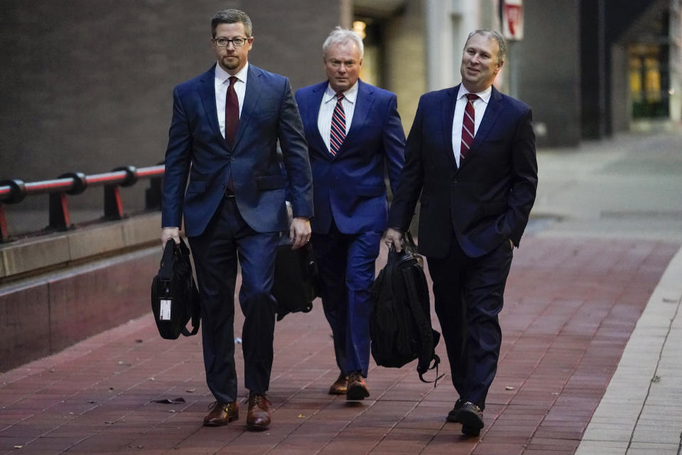 CORRECTS THAT PLANTS ARE FORMERLY OWNED BY FIRSTENERGY - Former Ohio Republican Party chair Matt Borges, right, walks toward Potter Stewart U.S. Courthouse with his attorneys Todd Long, left, and Karl Schneider, center, before jury selection in his federal trial, Friday, Jan. 20, 2023, in Cincinnati. Borges and former Ohio House Speaker Larry Householder are charged with racketeering in an alleged $60 million scheme to pass state legislation to secure a $1 billion bailout for two nuclear power plantsformerlyowned by Akron, Ohio-based FirstEnergy. Householder and Borges have both pleaded not guilty. (AP Photo/Joshua A. Bickel)