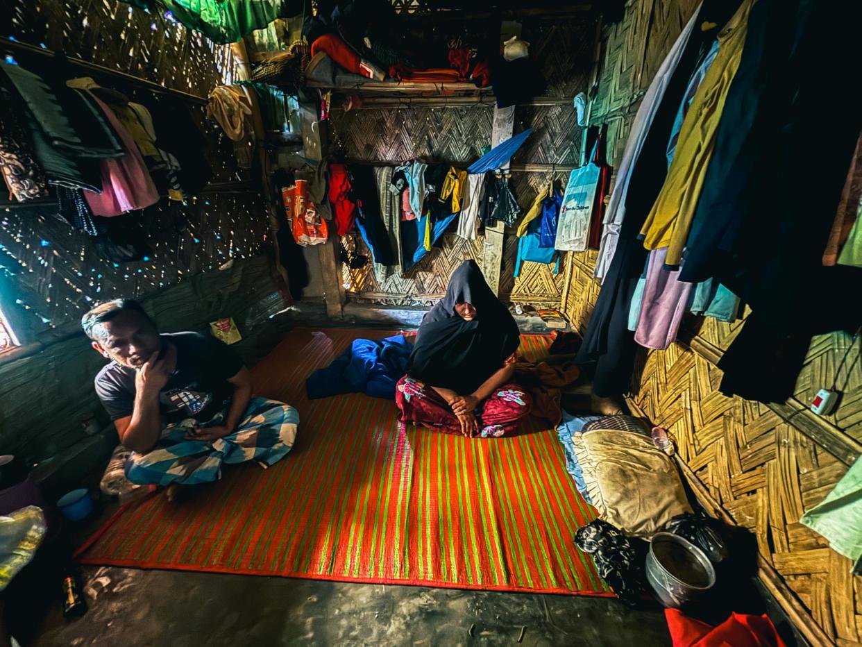 <span>Noor Saimun in her shelter in a refugee camp for Rohingya in Cox’s Bazar, Bangladesh. Her days are spent in crippling pain caused by her cancer.</span><span>Photograph: Kaamil Ahmed/The Guardian</span>