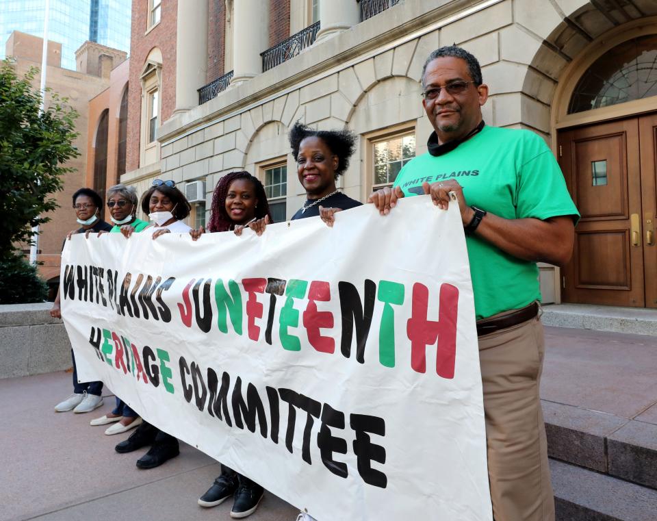 Wayne Bass, right, the Grand Marshal of the White Plains Juneteenth Celebration is pictured in front of White Plains City Hall June 15, 2021. With him are members from left, Jan Mazyck, Sheran Lyons, Patricia Moody, Denise N. Gray and Kemba Ellerbe. They held their virtual celebration on June 12, 2021. 