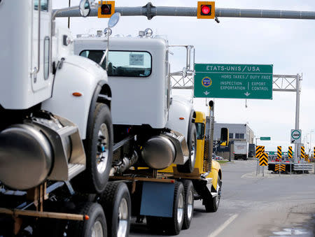 A truck heads towards the United States at the Lacolle border crossing in Lacolle, Quebec, Canada April 26, 2017. REUTERS/Christinne Muschi