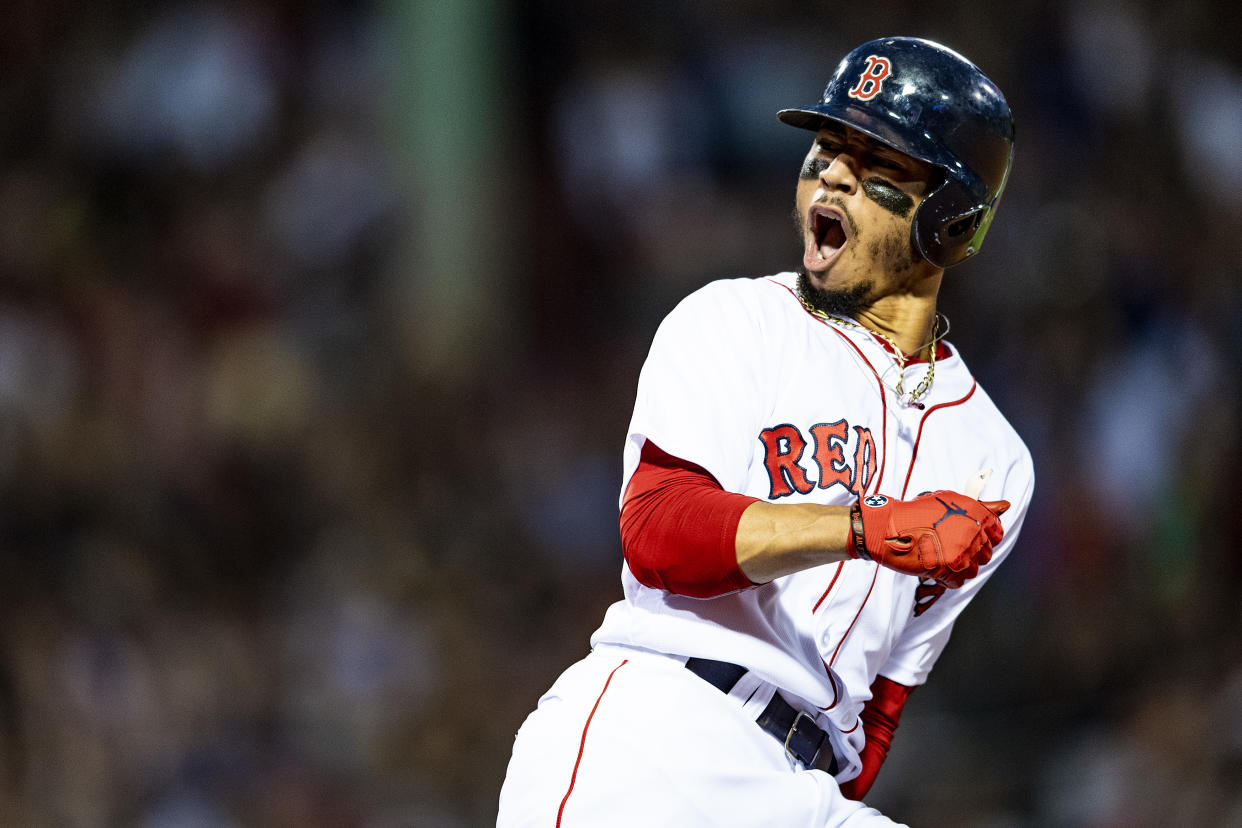 BOSTON, MA – JULY 12: Mookie Betts #50 of the Boston Red Sox reacts after hitting a grand slam home run during the fourth inning of a game against the Toronto Blue Jays on July 12, 2018 at Fenway Park in Boston, Massachusetts. (Photo by Billie Weiss/Boston Red Sox/Getty Images)