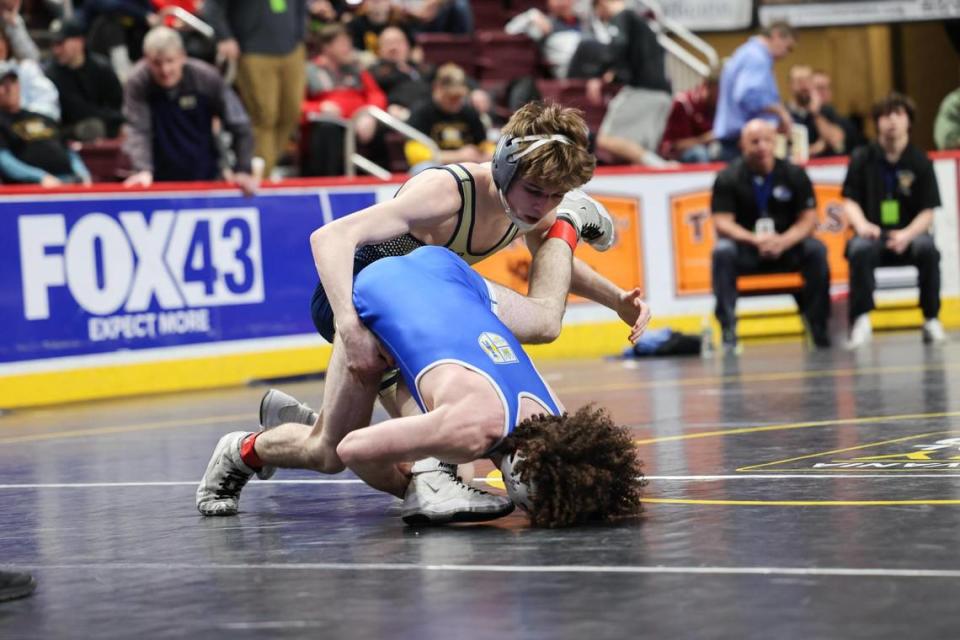 Bald Eagle Area’s Caden Judice scrambles with Conwell-Egan’s Kevin Bagnell in their 114-pound PIAA Class 2A consolation third round match on Friday, March 8, 2024 at the Giant Center in Hershey. Judice defeated Bagnell, 6-4, to secure his first PIAA medal.