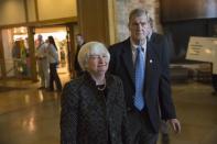 Janet Yellen (L), Chair of the Federal Reserve, enters the opening reception of the Jackson Hole Economic Policy Symposium in Jackson Hole, Wyoming August 21, 2014. REUTERS/David Stubbs