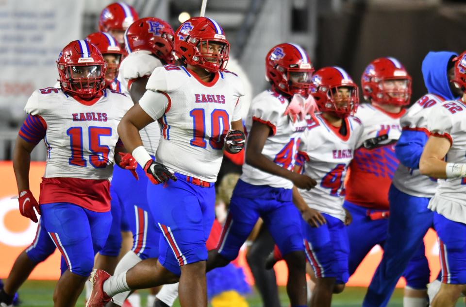 Pine Forest take the field to play Jesuit in the Class 6A state championship game at DRV PNK Stadium, Fort Lauderdale, FL  Dec. 17, 2021. 