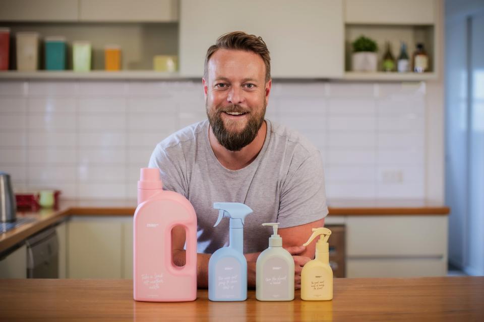 Pictured is Sydney man Mike Smith with four of Zero Co's containers.