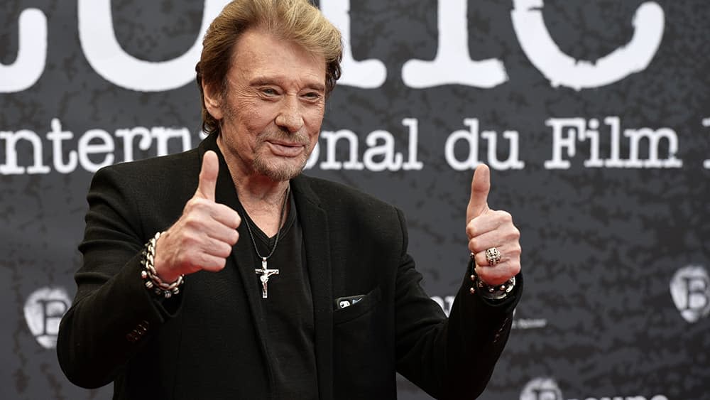 Johnny Hallyday, en avril 2014. - Jean-Philippe Ksiazek - AFP