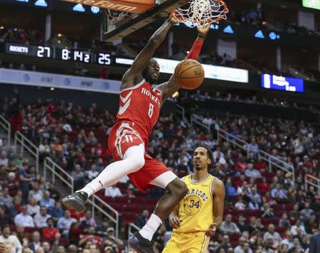 Nov 15, 2018; Houston, TX, USA; Houston Rockets forward James Ennis III (8) dunks the ball against Golden State Warriors guard Shaun Livingston (34) during the second quarter at Toyota Center. Troy Taormina-USA TODAY Sports