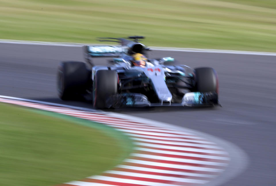 <p>Mercedes driver Lewis Hamilton of Britain steers his car during the Japanese Formula One Grand Prix at Suzuka, Japan, Sunday, Oct. 8, 2017. (AP Photo/Eugene Hoshiko)</p>
