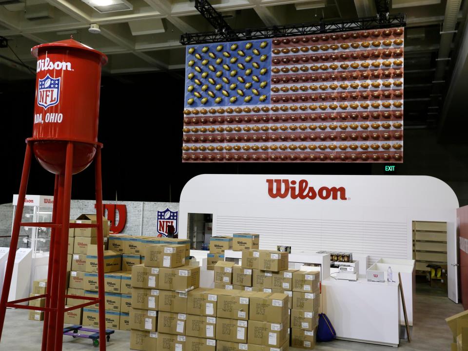 A miniature Wilson football factory is seen at the NFL Experience during a preview tour of Super Bowl 50 official fan attractions Friday, Jan. 29, 2016, in San Francisco.