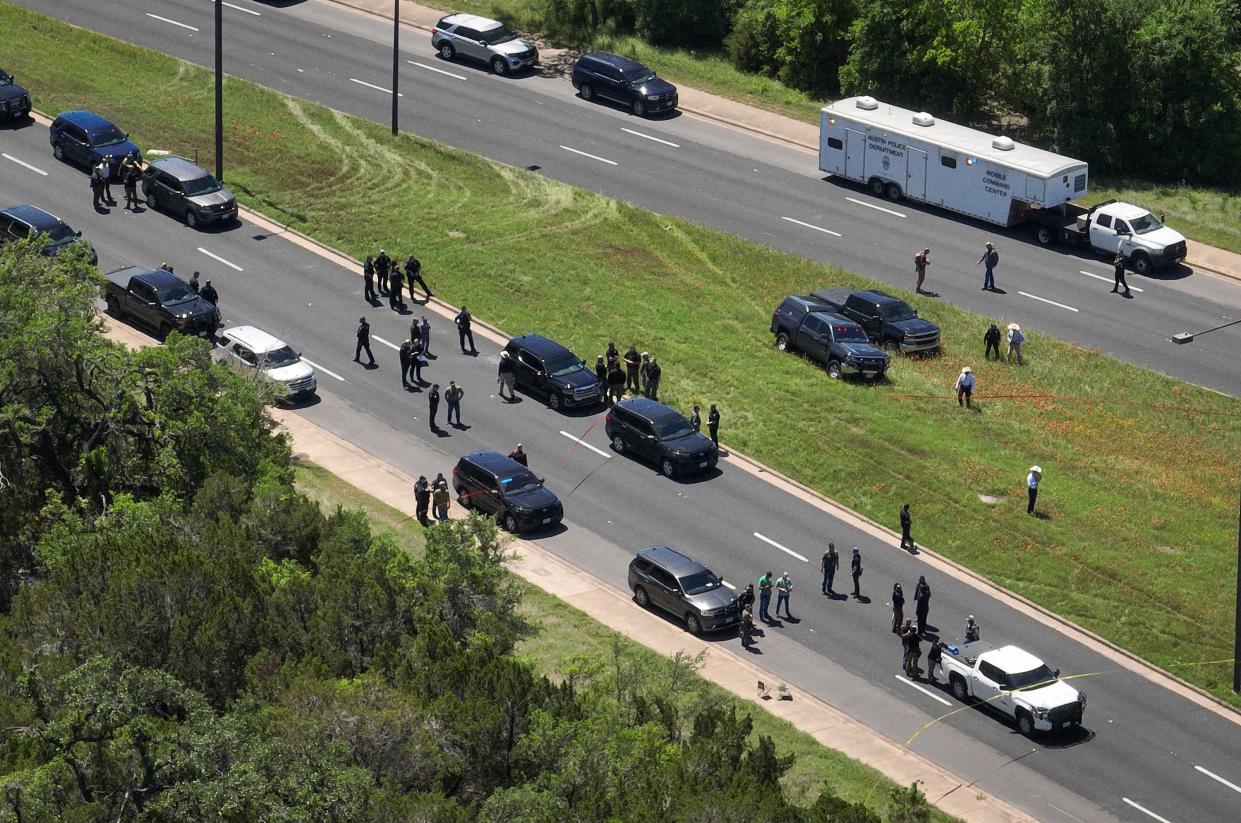 Law enforcement officers respond to an officer-involved shooting in the 6600 block of West William Cannon Drive in Southwest Austin on Wednesday.