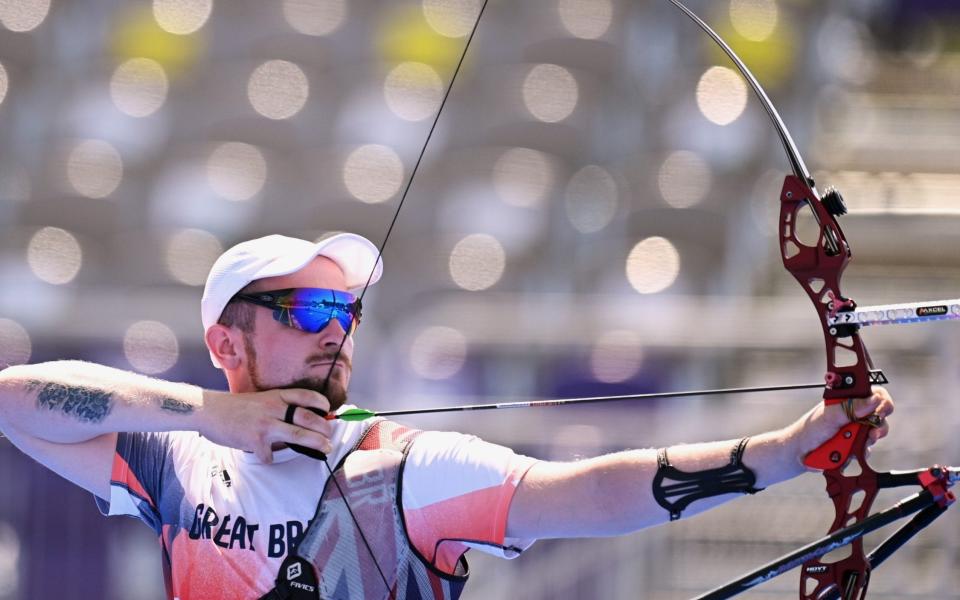 Patrick Huston was eliminated at the round of 32 in the archery  - REUTERS