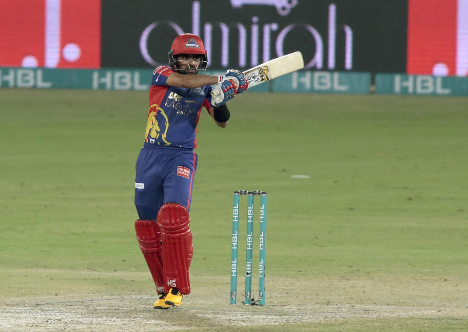 Karachi Kings Babar Azam plays a shot against Lahore Qalandars during the final of their Pakistan Super League T20 cricket match at National Stadium in Karachi, Pakistan, Tuesday, Nov. 17, 2020. (AP Photo/Fareed Khan)