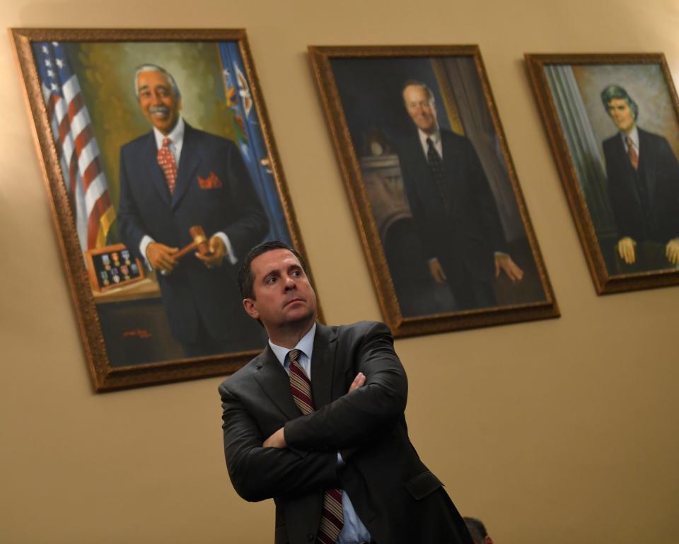 Ranking member Devin Nunes, R-Calif. listens as Ambassador Kurt Volker, the former U.S. special envoy for Ukraine, and National Security Council official Timothy Morrison testify.