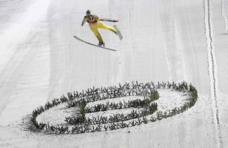 Ski Jumping - 65th four-hills ski jumping tournament final round - Bischofshofen, Austria - 06/01/2017 - Norway's Daniel Andre Tande struggles during his final jump. REUTERS/Dominic Ebenbichler