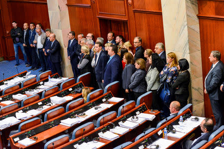 A group of opposition members of the VMRO-DPMNE stand to boycott the vote as the Macedonian parliament passed constitutional changes to allow the Balkan country to change its name to the Republic of North Macedonia, in Skopje, Macedonia, October 19, 2018. REUTERS/ Tomislav Georgiev