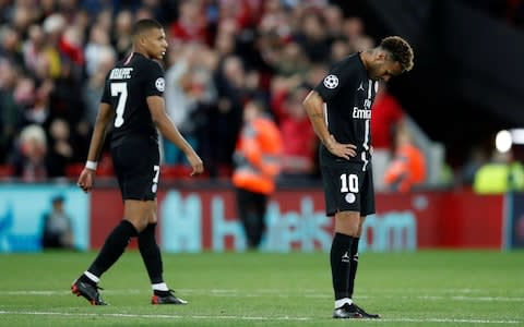 Paris St Germain's Neymar and Kylian Mbappe look dejected after Liverpool's third goal - Credit: REUTERS