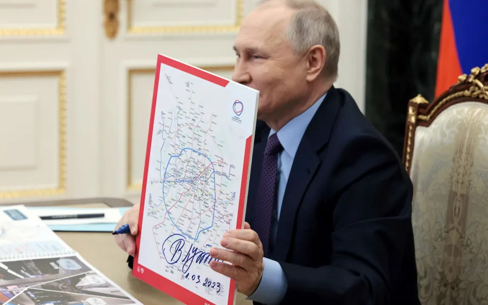 Vladimir Putin takes part in the ceremony of the opening of the Big Circle Line (BCL) of the Moscow subway - MIKHAIL METZEL/Shutterstock