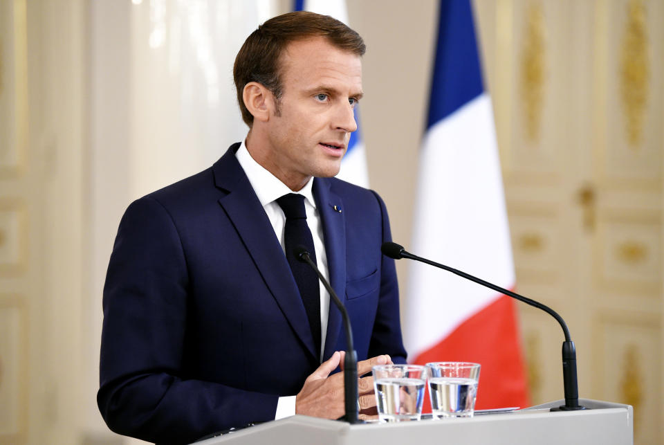 French President Emmanuel Macron attends a joint press conference with Finland President Sauli Niinisto at Presidential Palace in Helsinki, Finland, Thursday Aug. 30, 2018. President Macron is in Finland on a two-day official visit. (Antti Aimo-Koivisto/Lehtikuva via AP)