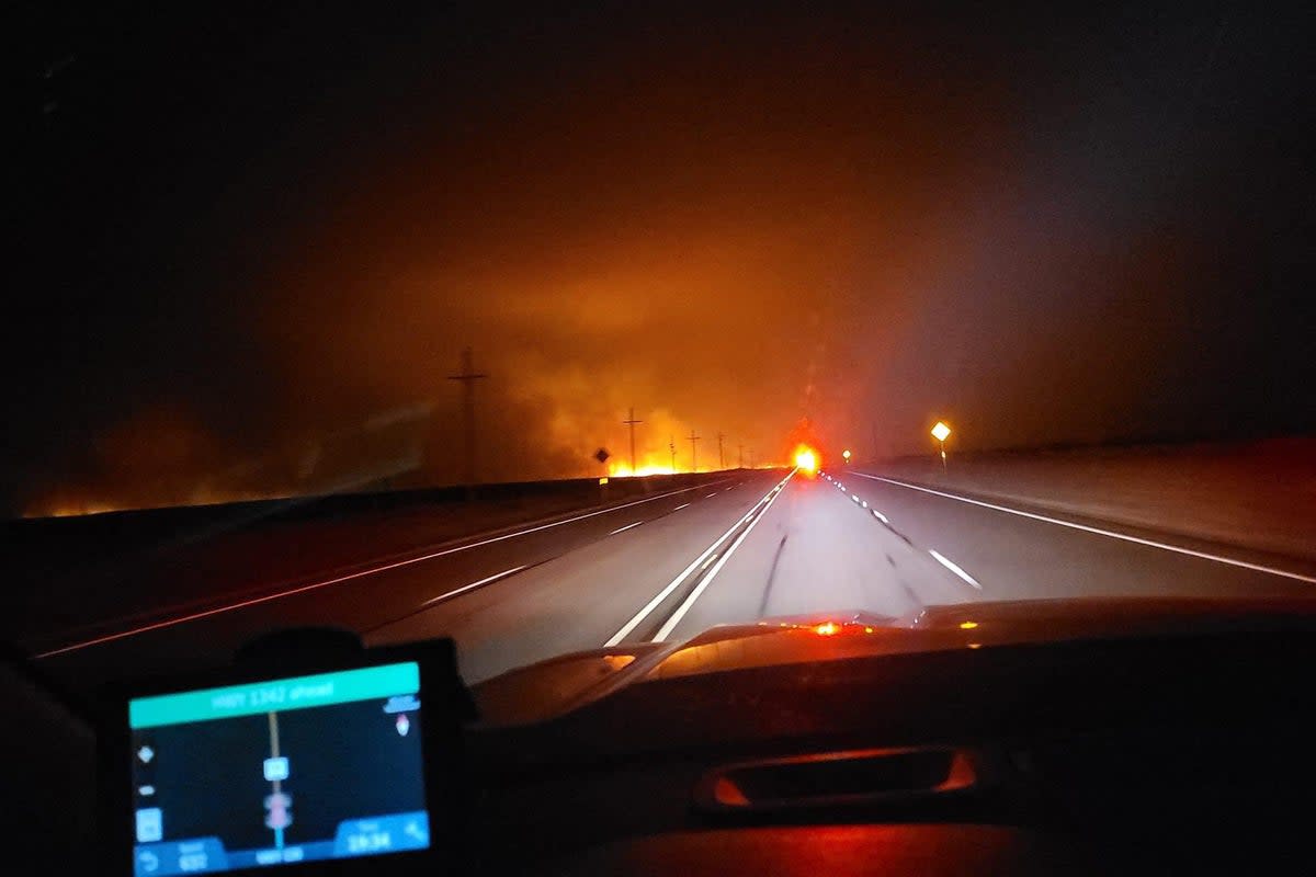 A fire truck driving towards the Smokehouse Creek Fire, near Amarillo, in the Texas Panhandle (Amarillo Fire Department/AFP via)