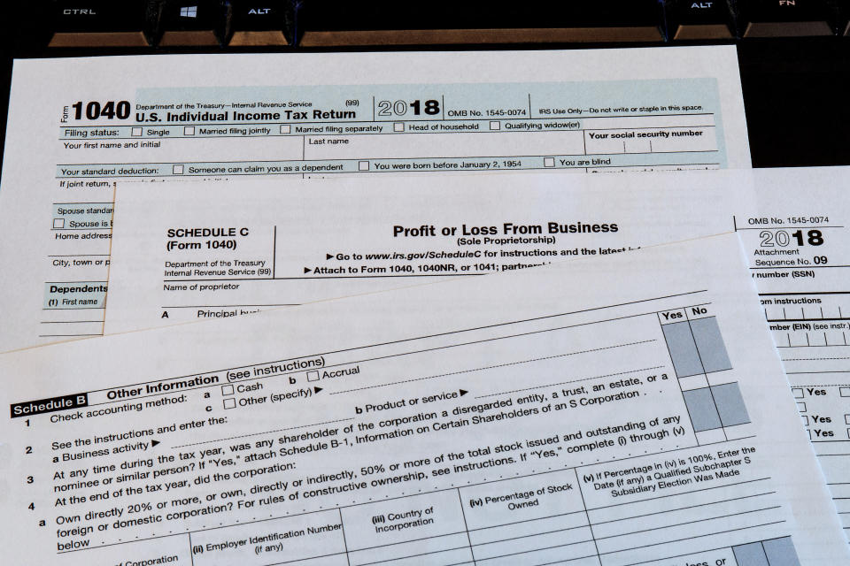 Tax forms stacked up for the 2018 tax year. Most taxpayers have until the April 18 deadline to file their 2018 tax returns and claim refunds. 