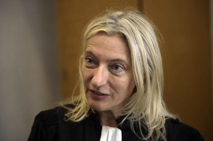 Isabelle Steyer, lawyer for a child protection group, on September 8, 2015 outside a courtroom in Melun, France, saying the death of a three-year-old boy, who was locked inside a washing machine by his parents, was "not an isolated act" (AFP Photo/Lionel Bonaventure)